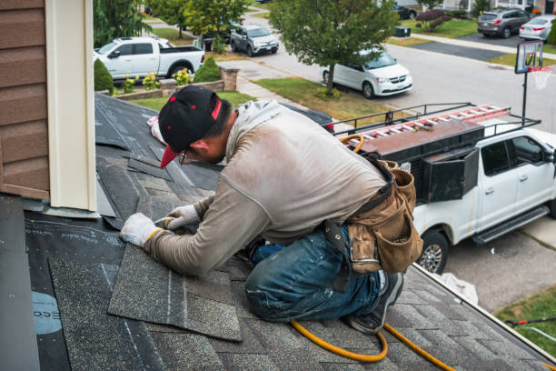 Professional Roofing technician working in Marlboro, NJ